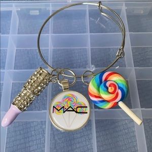 Silver plated bangle with charms